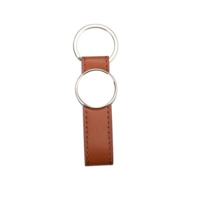 Round keychain with an elongated eco-leather pad for printing